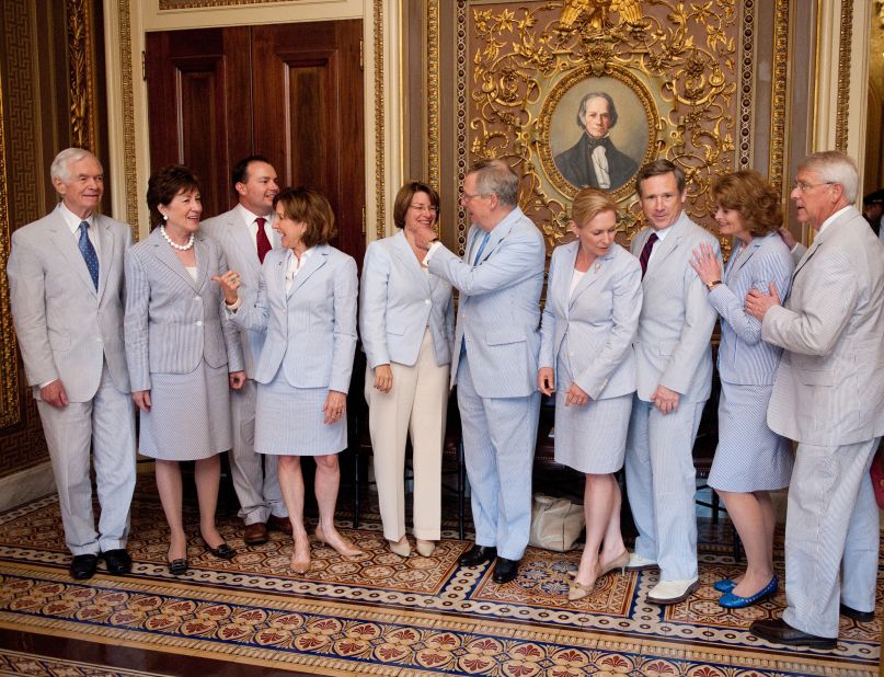 Gillibrand, fourth from right, and other senators wear seersucker suits in Washington in June 2011. The third Thursday of June is traditionally called Seersucker Thursday.