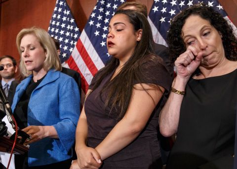 Gillibrand is joined by Anna, a survivor of sexual assault, and Anna's mother Susan during a news conference in Washington in July 2014. Gillibrand was discussing a bill called the Campus Accountability and Safety Act.