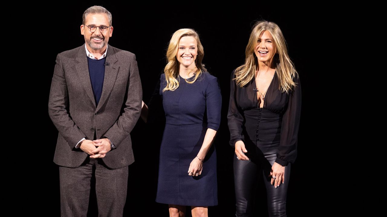 Actors Steve Carell, Reese Witherspoon and Jennifer Aniston speak during an event launching Apple tv+ at Apple headquarters on March 25, 2019, in Cupertino, California. (Photo by NOAH BERGER / AFP)        (Photo credit should read NOAH BERGER/AFP/Getty Images)