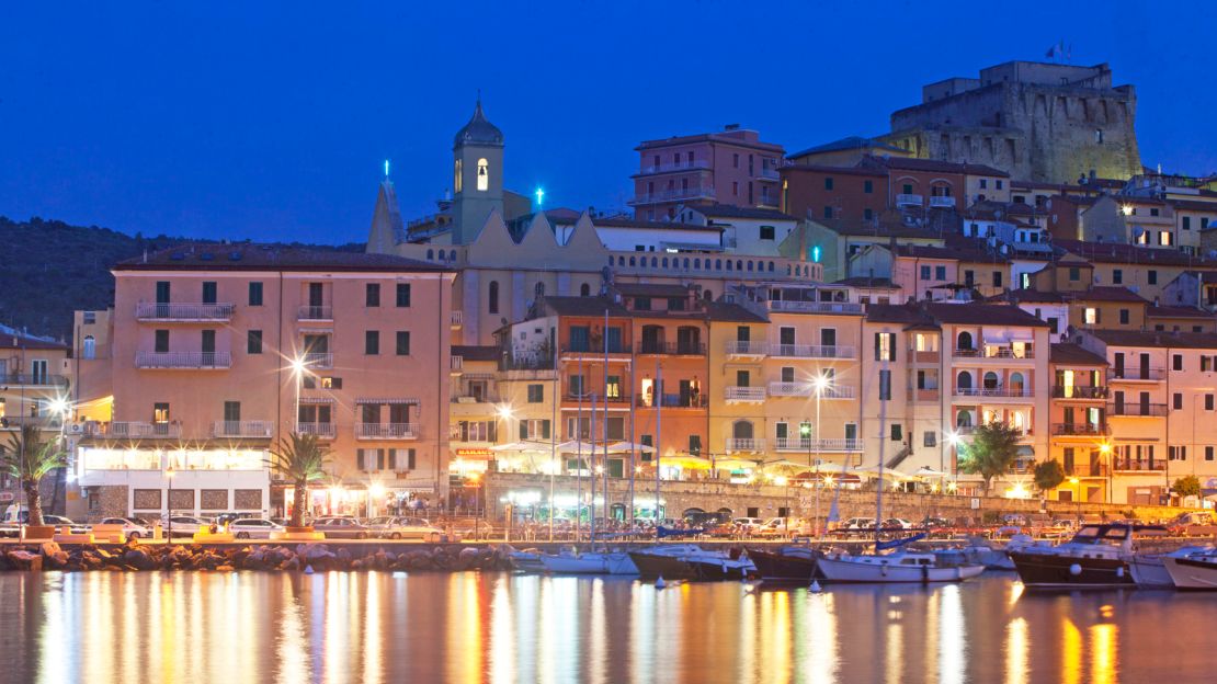 Santo Stefano port is bustling with locals and tourists during summer evenings.