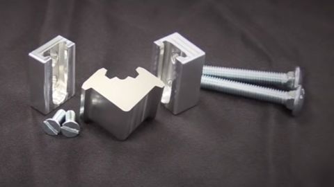 The pieces of Owensville's simple steel lock.