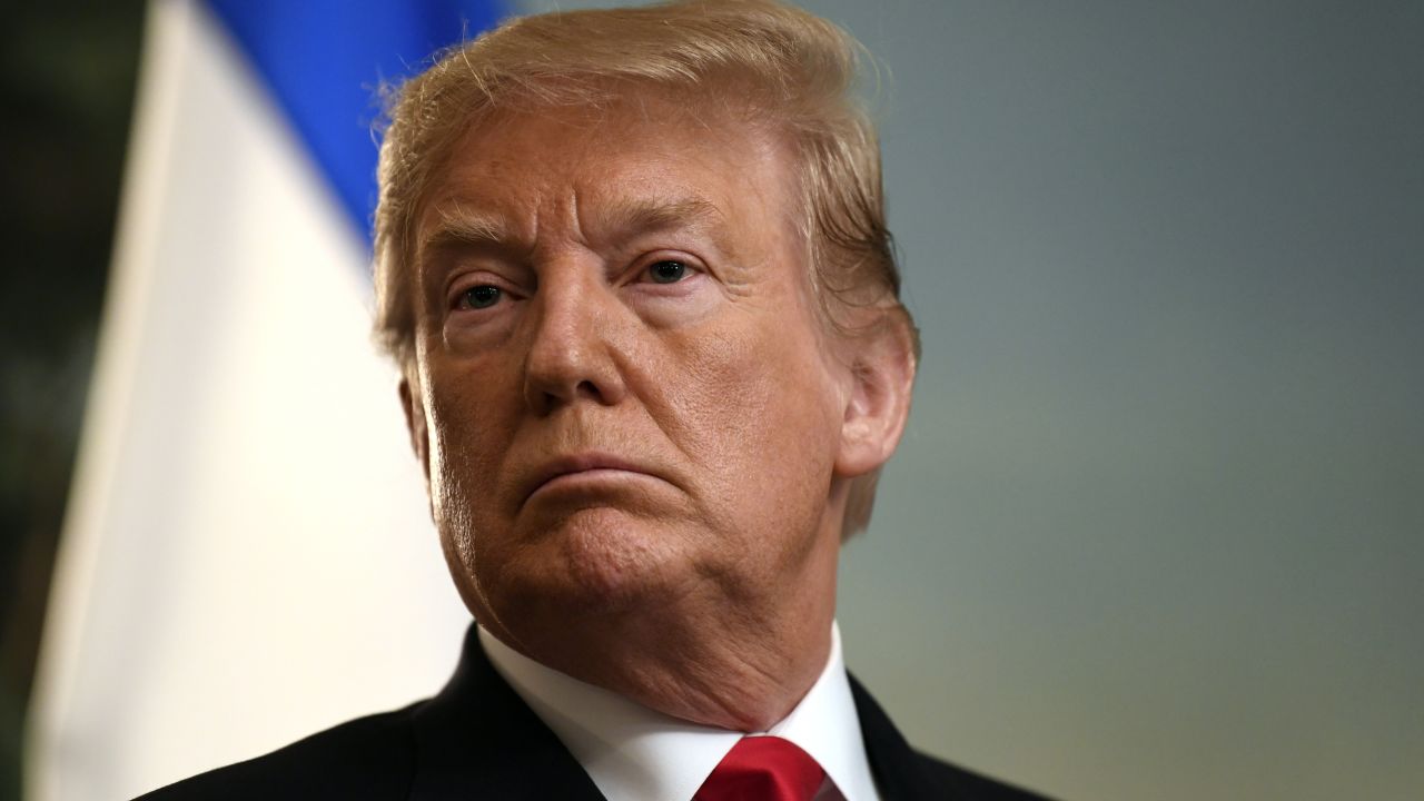 President Donald Trump listens in the Diplomatic Reception Room of the White House in Washington, Monday, March 25, 2019, as Israeli Prime Minister Benjamin Netanyahu speaks. Trump signed an official proclamation formally recognizing Israel's sovereignty over the Golan Heights. (AP Photo/Susan Walsh)