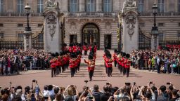 LONDON, ENGLAND - JUNE 24:  Tourists watch the Changing of the Guard at Buckingham Palace on June 24, 2015 in London, England.  The Queen may have to move out of Buckingham Palace, her official London residence, so that maintenance work with an estimated cost of £150 million GBP can be carried out. The Crown Estate, which owns property on the Queen's behalf, has announced record profits of £285m last year, a rise of 6.7%, whilst taxpayer funding of the Queen is anticipated to increase by £2m next year to £42.8m.  (Photo by Rob Stothard/Getty Images)