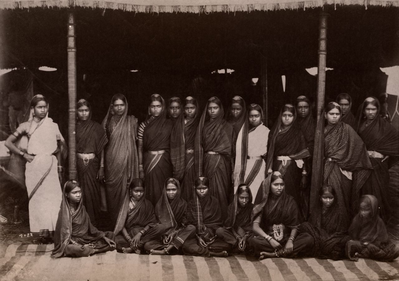 Devadasis -- Hindu women who commit to a lifetime of worship -- pictured at a south Indian temple in around 1880.