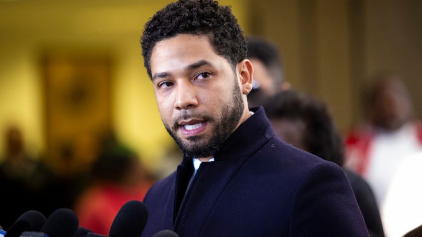 Actor Jussie Smollett speaks to reporters at the Leighton Criminal Courthouse in Chicago after prosecutors dropped all charges against him, Tuesday, March 26, 2019. (Ashlee Rezin/Chicago Sun-Times via AP)