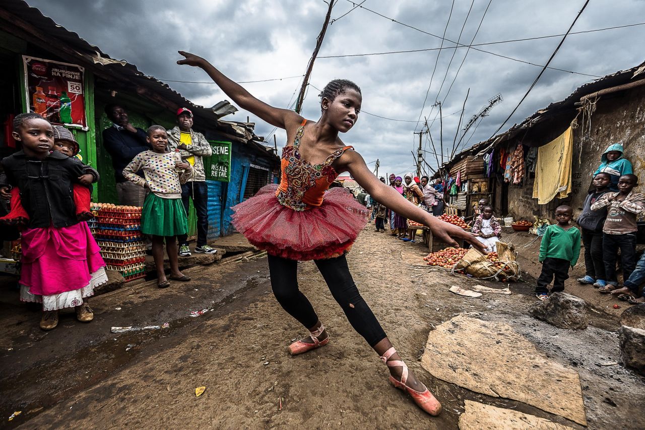An image by Kenyan photographer Brian Otieno captures a young ballet dancer in Nairobi's Kibera slum.