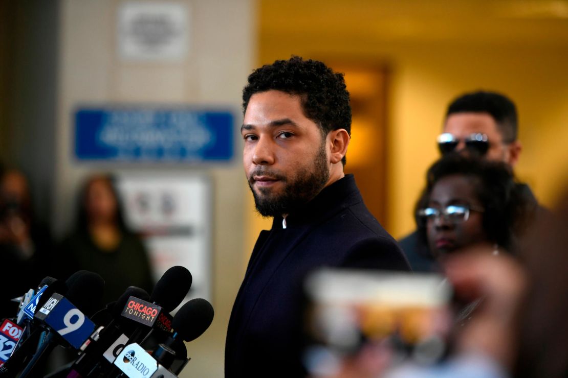 Jussie Smollett talks to the media before leaving Cook County Court after his charges were dropped.