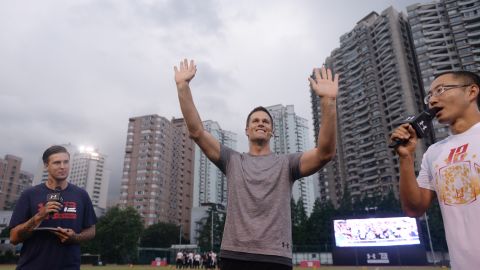 Brady waves to fans during a promotional event in Shanghai in 2017.