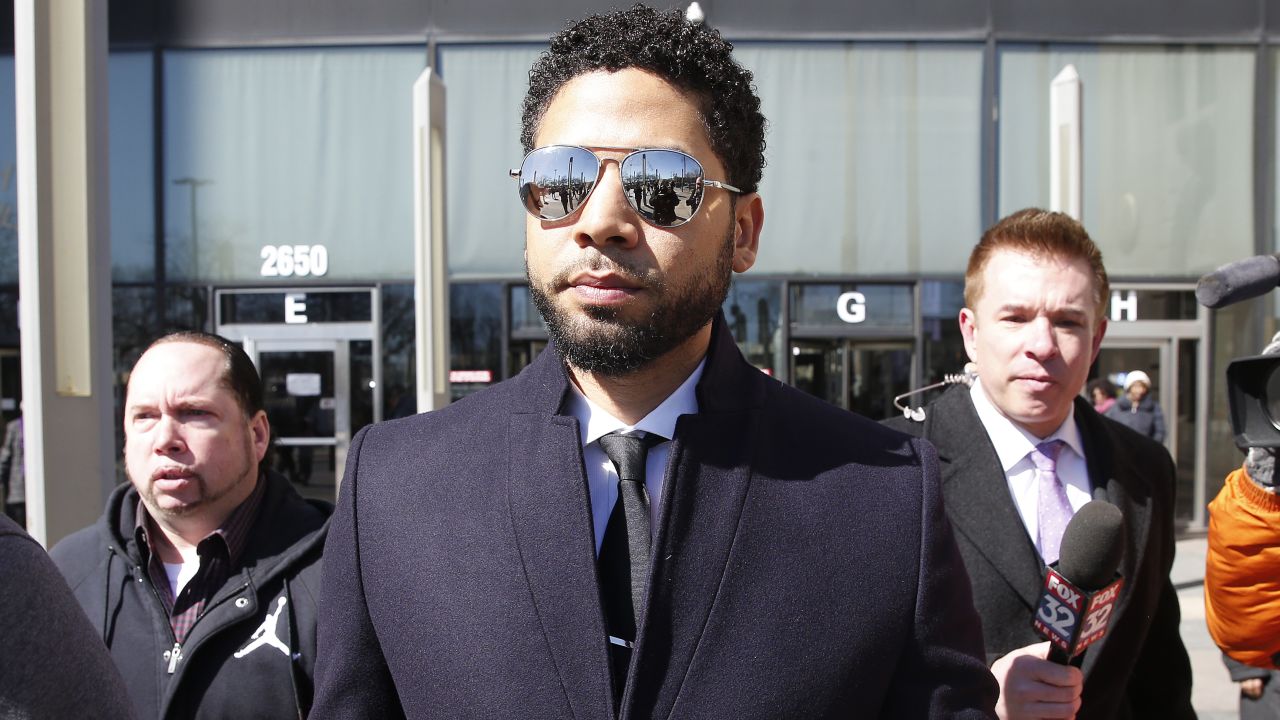 Jussie Smollett leaves a Chicago courthouse Tuesday after the charges were dropped against him.
