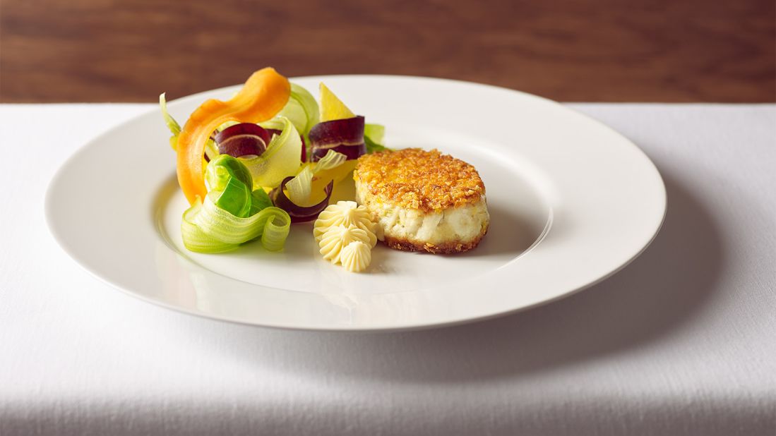 <strong>On order:</strong> One dish is pitch-perfect crab cakes paired with local vegetables.