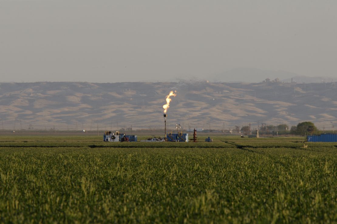 Natural gas flares shoot from a facility in California used for drilling.