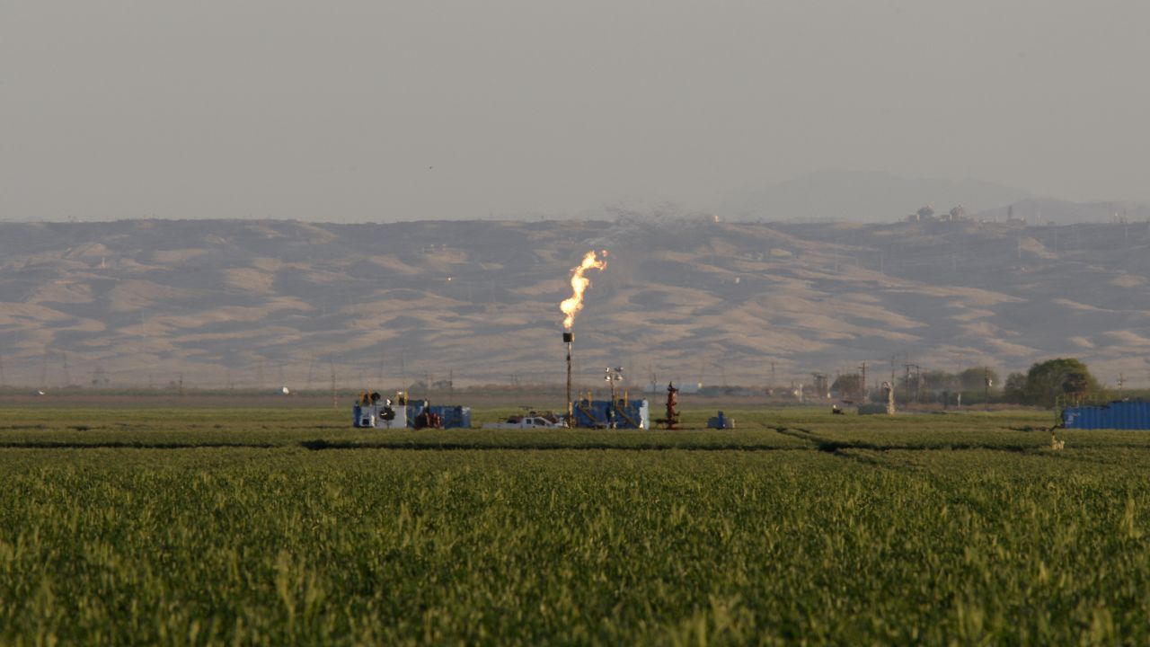 Gas is flared as waste at a California fracking facility in 2014.