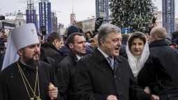 KIEV, UKRAINE - JANUARY 07: Metropolitan Epiphanius of Kiev and All Ukraine (L), with Ukrainian President Petro Poroshenko (C) on Sofiyivska Square following Christmas liturgy at St. Sophia's Cathedral on January 07, 2019 in Kiev, Ukraine. The independent Orthodox Church of Ukraine, which previously fell under the authority of Moscow, was granted official recognition yesterday in a decree, or "tomos," signed yesterday in Istanbul by the Ecumenical Patriarch of Constantinople Bartholomew I in a move with deep historical roots but fueled by contemporary political conflict between Ukraine and Russia. (Photo by Brendan Hoffman/Getty Images)