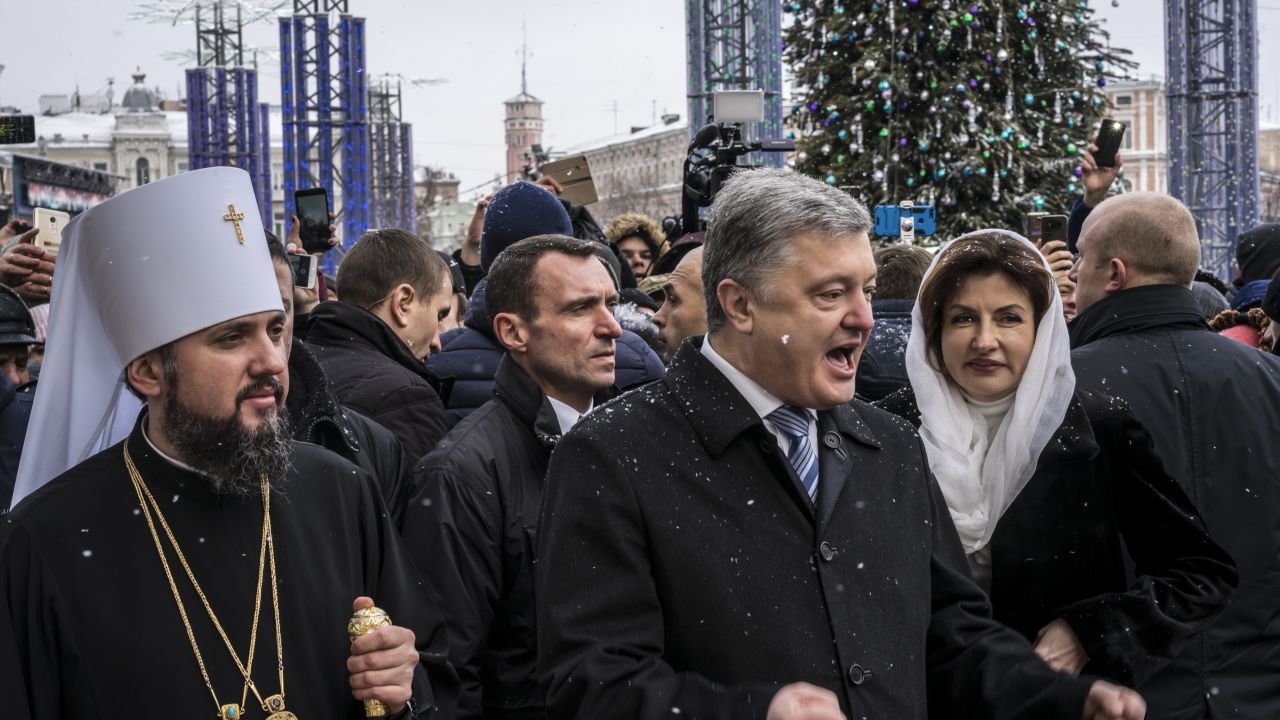 Incumbent President Petro Poroshenko (center) is likely to reach the second round on April 21, according to preliminary results.