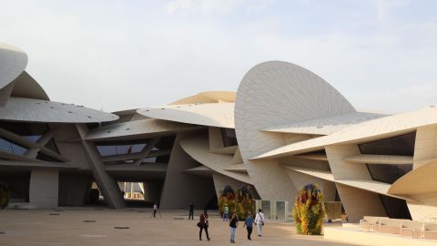 A picture taken on March 27, 2019 shows a partial view of the National Museum of Qatar, desigend by French architect Jean Nouvel, in the Gulf emirate's capital Doha. - The complex architectural form of a desert rose, found in Qatars arid desert regions, inspired the striking design of the new museum building, conceived by Nouvel. (Photo by KARIM JAAFAR / National Museum of Qatar / AFP)        (Photo credit should read KARIM JAAFAR/AFP/Getty Images)