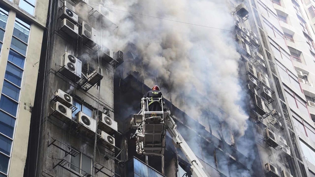 Firefighters works to douse the fire.