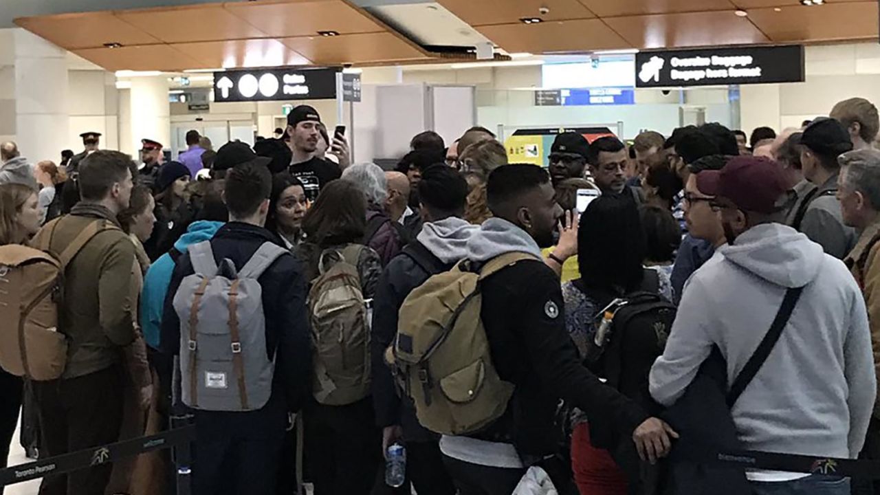 From tweet: "20 min to board, @wowairsupport cancels the flight. But then sends an email that it's just delayed until 9pm. Oh but the crew left because it was cancelled. Updates coming from the guy in the middle of this crowd."