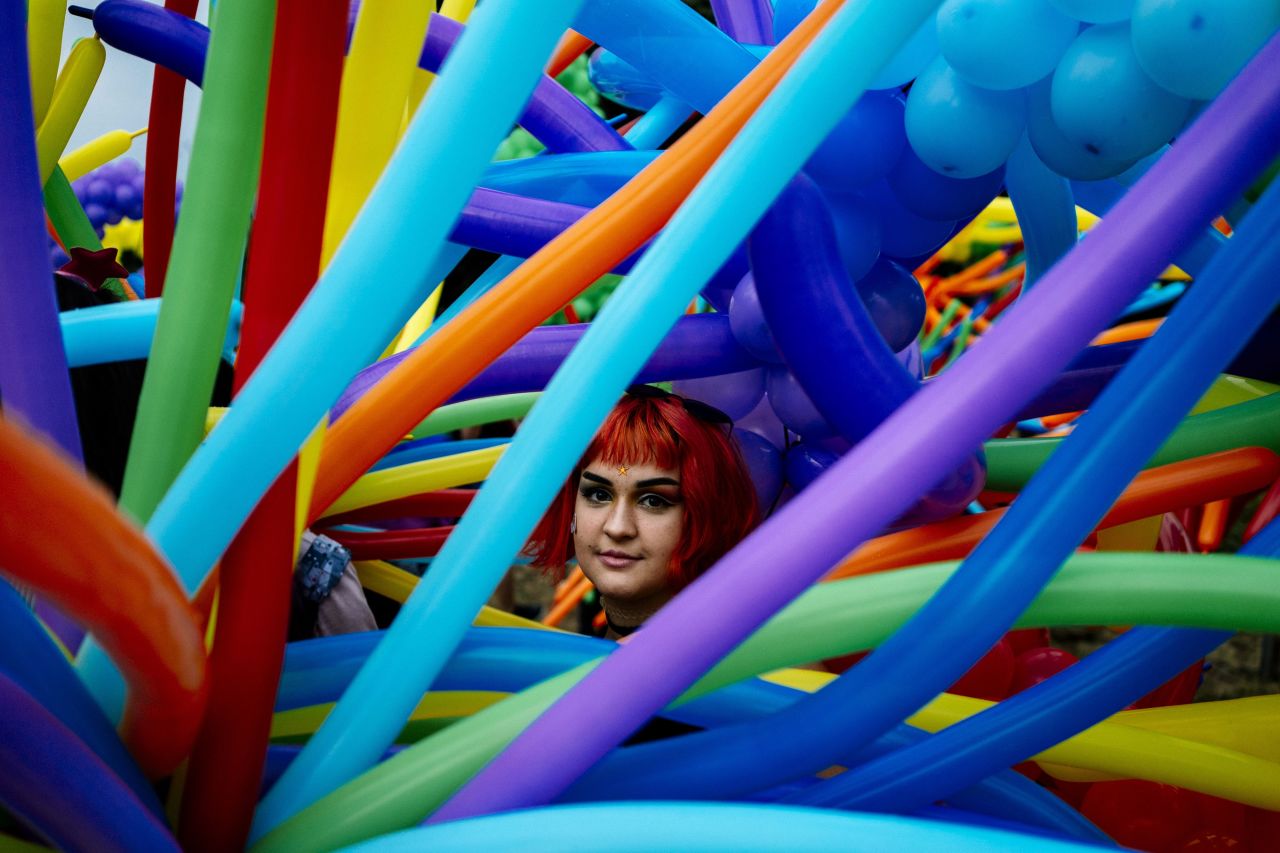 <strong>Sofia, Bulgaria. </strong>A participant looks through Pride balloons during the 11th Gay Pride Parade in the Bulgarian capital in June 2018.