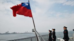 Taiwanese sailors salute the island's flag on the deck of the Panshih supply ship after taking part in annual drills, at the Tsoying naval base in Kaohsiung on January 31, 2018.
Taiwanese troops staged live-fire exercises the day before on January 30 to simulate fending off an attempted invasion, as the island's main threat China steps up pressure on President Tsai Ing -Wen. / AFP PHOTO / Mandy CHENG        (Photo credit should read MANDY CHENG/AFP/Getty Images)