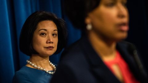 US Attorney for the District of Columbia Jessie Liu looks on as Washington, DC, Mayor Muriel Bowser speak during a news conference on Wednesday, February 6, 2019, in Washington.
