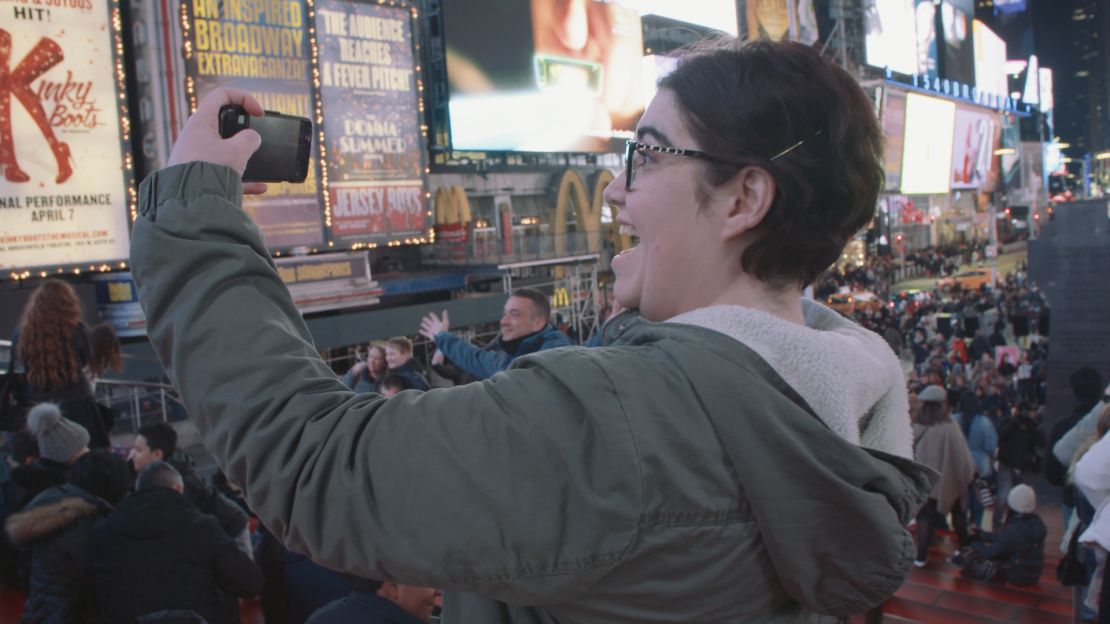 Joyner snaps an obligatory selfie in Times Square.