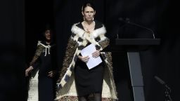 New Zealand Prime Minister Jacinda Ardern walks onto the stage to address a national remembrance service in Hagley Park for the victims of the March 15 mosque terrorist attack in Christchurch, New Zealand, Friday, March 29, 2019. (AP Photo/Mark Baker)