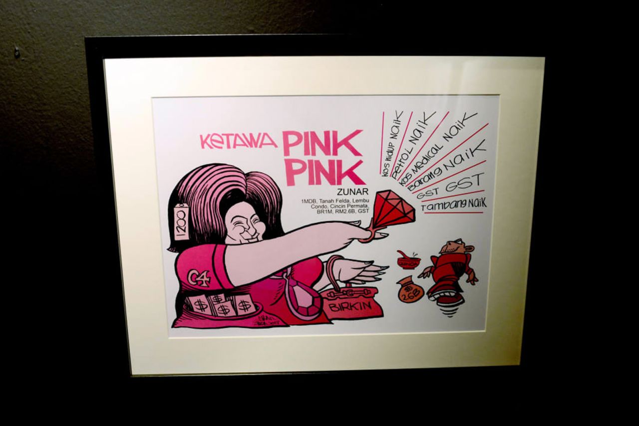 A cartoon of former Malaysian first lady Rosmah Mansor by Zunar is seen in a gallery in Kuala Lumpur.
