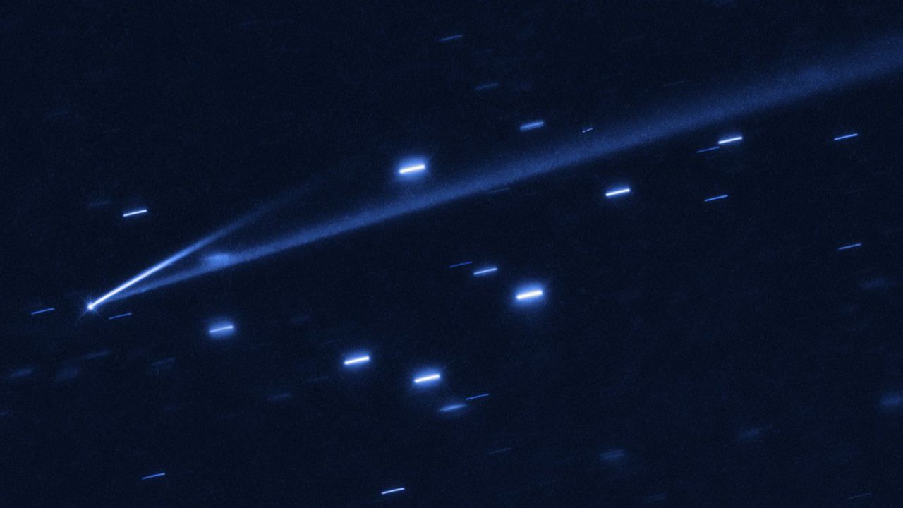 The asteroid 6478 Gault is seen with two tails indicating its self-destruction.