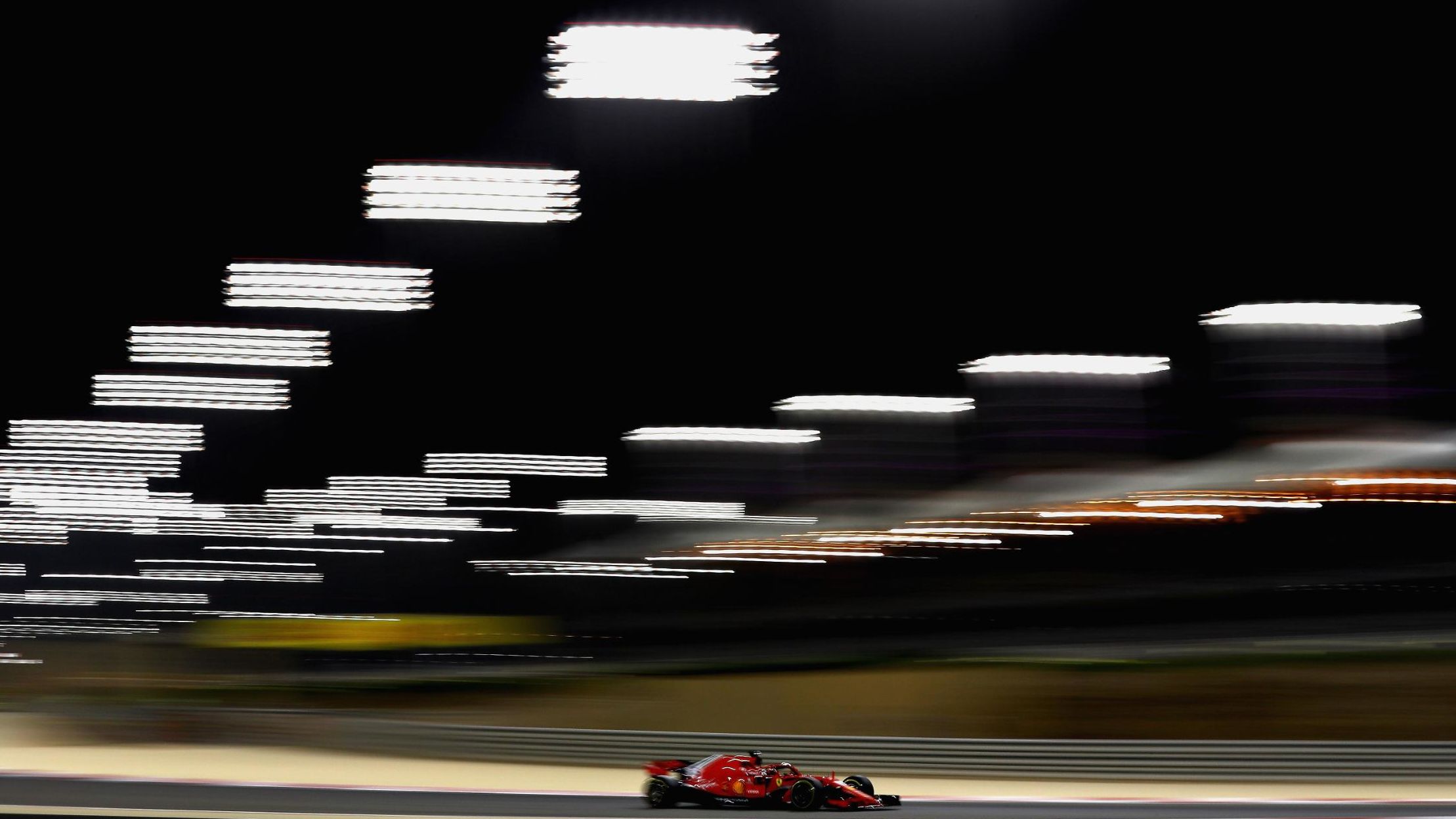 Sebastian Vettel drives his Ferrari en route to winning of the 2018 Bahrain Grand Prix.