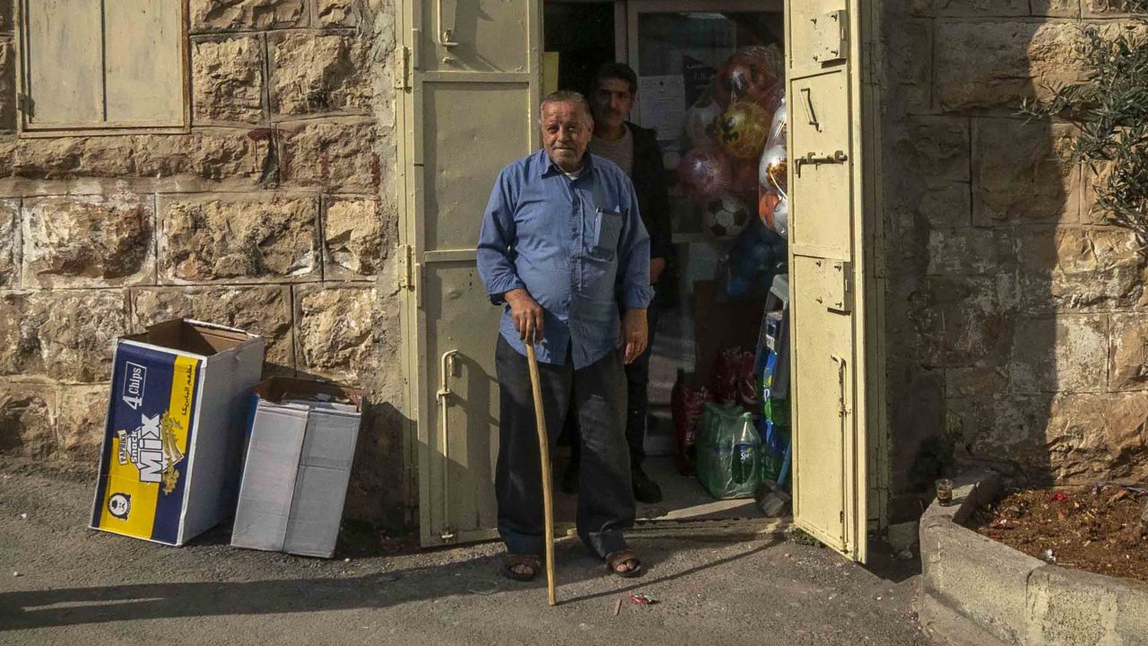 Abu Jalal owns a shop right in front of Zein Idris's school and was present when the soldiers marched him out.
