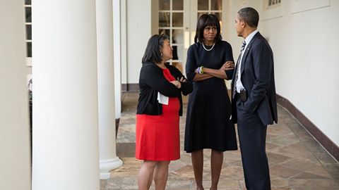 Tina Tchen talks with the Obamas in 2013 at the White House.