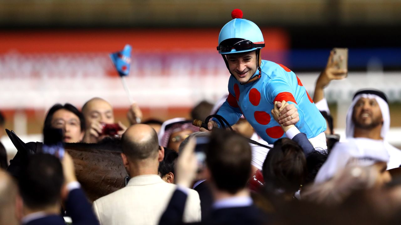 Christophe Lemaire riding Almond Eye celebrates after winning the Dubai Turf at the Dubai World Cup on March 30 in Dubai.