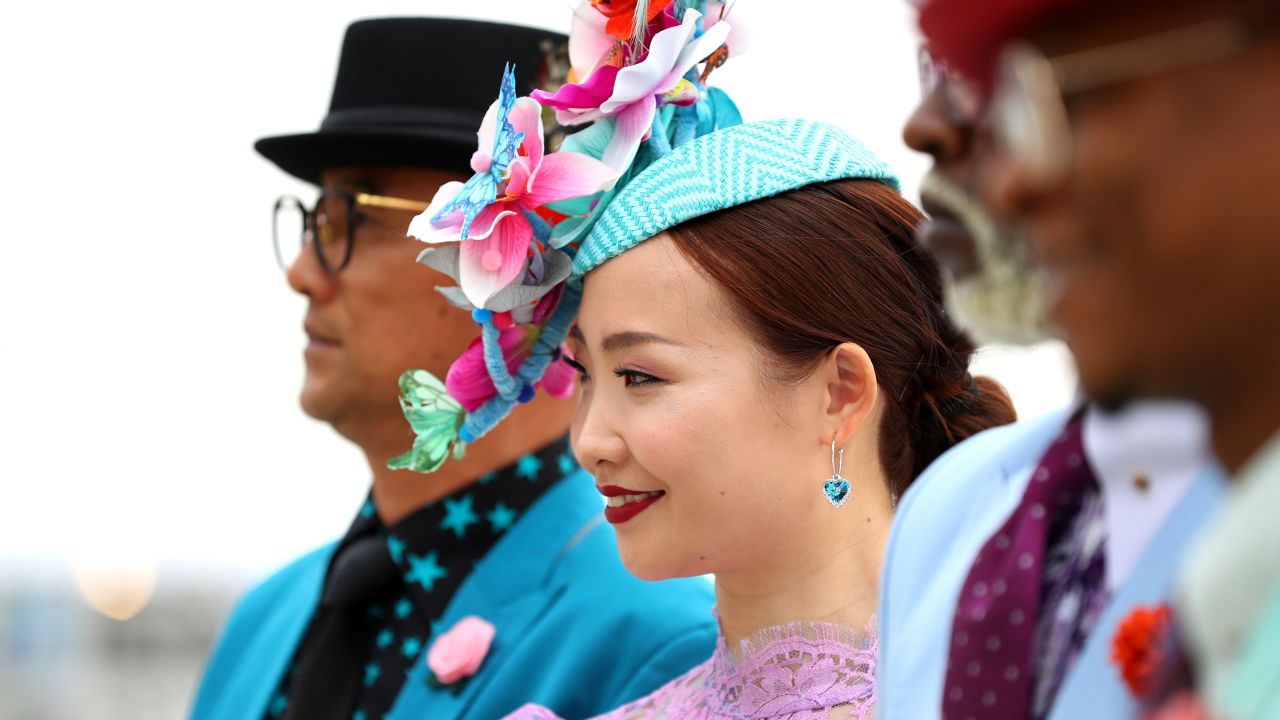 A fan looks on during the Dubai World Cup at Meydan Racecourse on March 30 in Dubai.