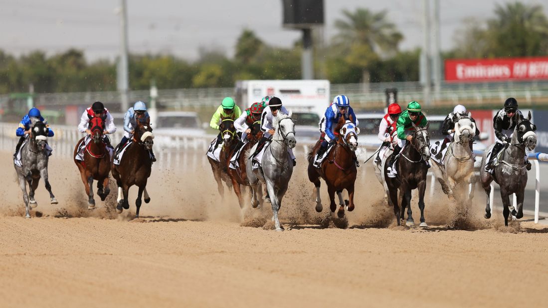 Jockeys on their horses compete at the Dubai Kahayla Classic race during the Dubai World Cup 2019 at the Meydan Racecourse in Dubai on March 30.