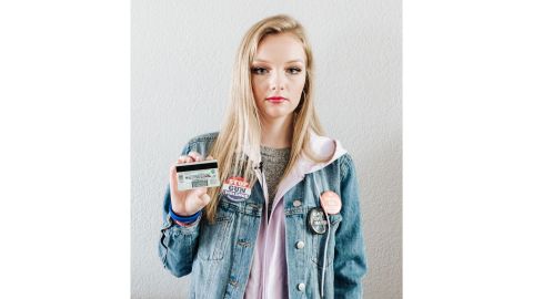 Kaylee Tyner displays the #MyLastShot sticker on the back of her ID.