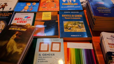 Books on gender identity and the "natural family" are seen at a trade stall inside the WCF Verona.  