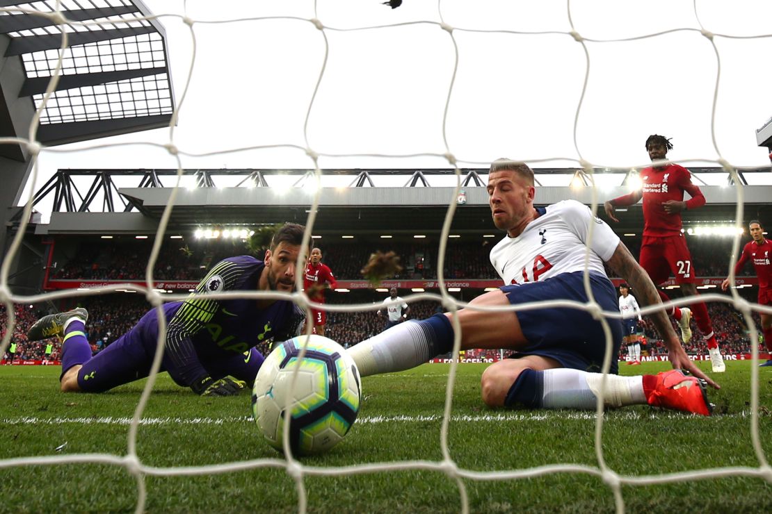 Toby Alderweireld is unable to stop the ball crossing the line for Liverpool's second goal.