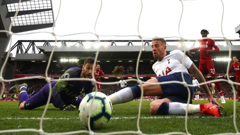 Toby Alderweireld is unable to stop the ball crossing the line for Liverpool's second goal.