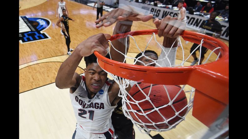 Rui Hachimura of the Gonzaga Bulldogs dunks the ball against Mfiondu Kabengele of the Florida State Seminoles during their Sweet Sixteen game at Honda Center in Anaheim, California on Thursday, March 28. The Bulldogs defeated the Seminoles 72-58 to advance to the Elite Eight.