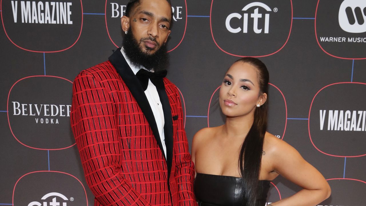 Nipsey Hussle and Lauren London attend a pre-Grammy party in Los Angeles on February 7. 