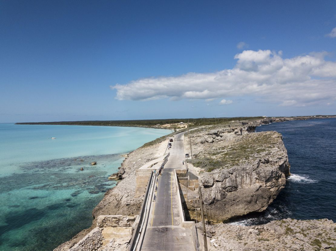 The Glass Window Bridge spans a sliver of land separating the deep blue Atlantic from the Bight of Eleuthera.