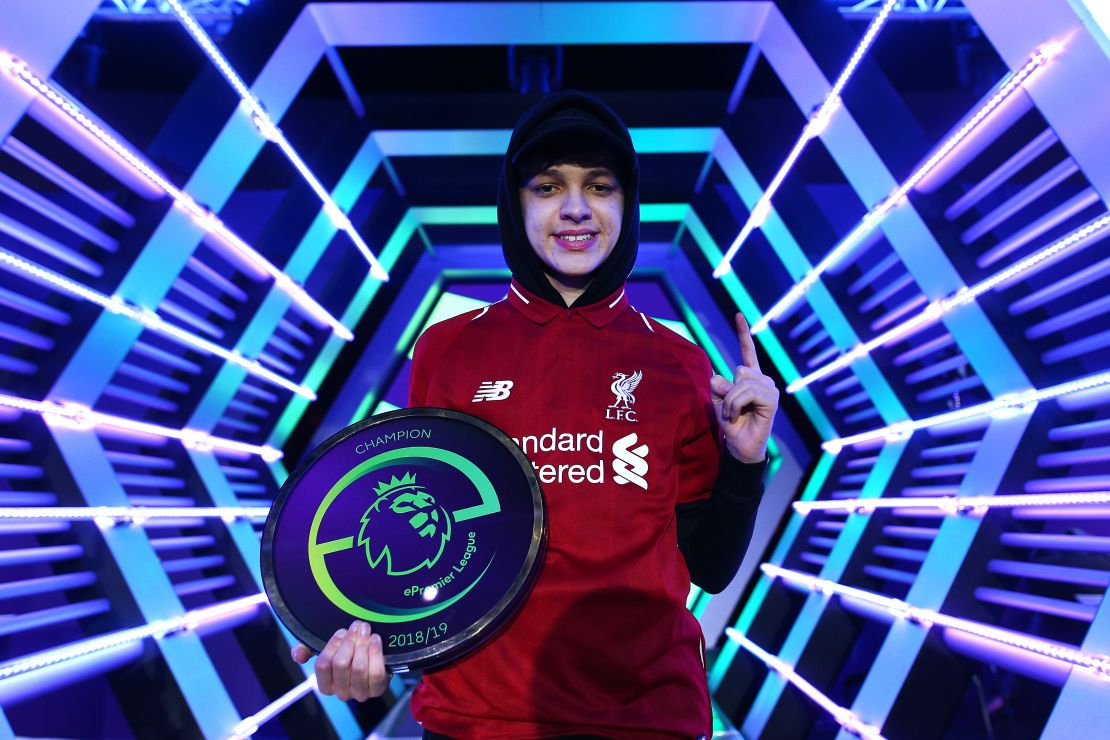 Liverpool's Donovan Hunt 'F2Tekkz' celebrates becoming the first ePremier League champion. 