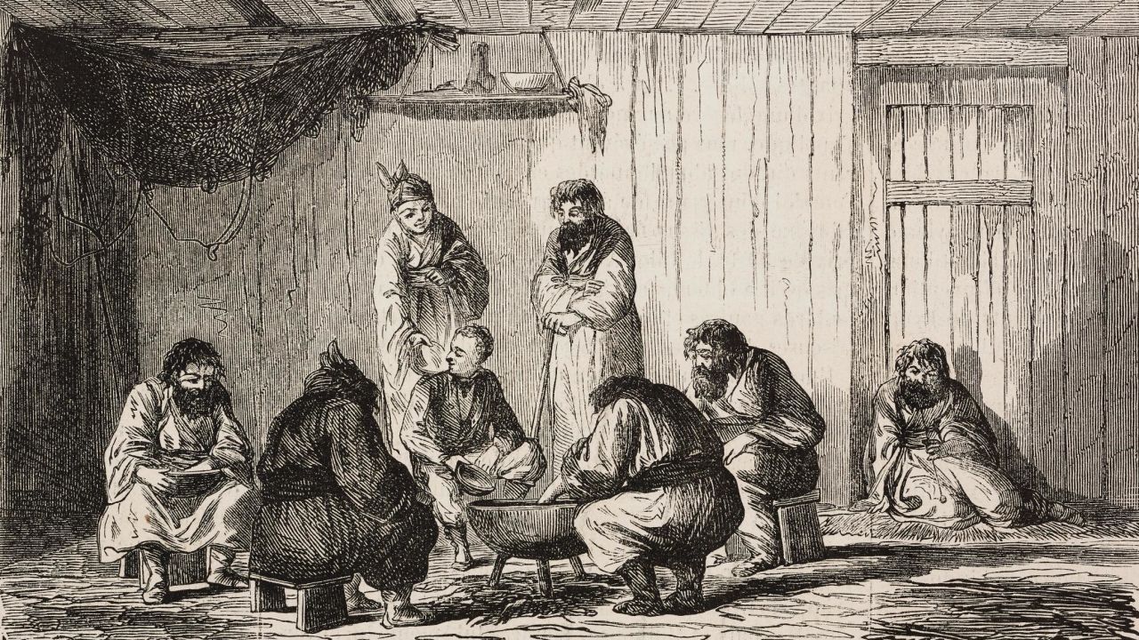 A family of Ainu gives a meal to a Western man in a sketch.