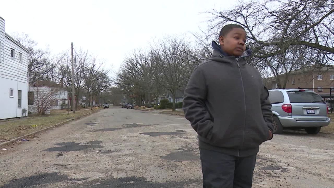 Monte Scott fixed the potholes by filling them with dirt 