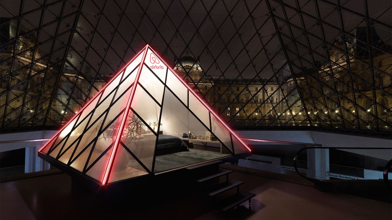 The pyramid-inspired tent is inside the actual pyramid designed by I.M. Pei.