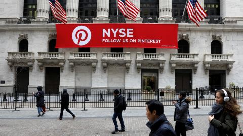 A Pinterest banner hangs on the facade of the New York Stock Exchange during the morning rush in February 2018. Pinterest is expected to go public later this month.