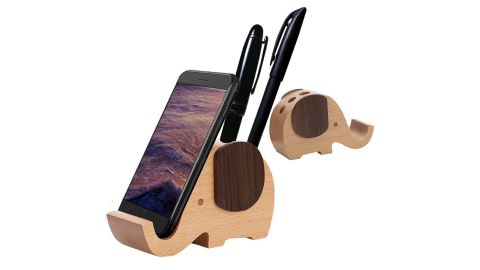 <strong>A cute little elephant who will hold your phone in place</strong> Wood Elephant Phone Stand ($10.99; <a href="https://amzn.to/2VffFwP" target="_blank" target="_blank">amazon.com</a>) <br />