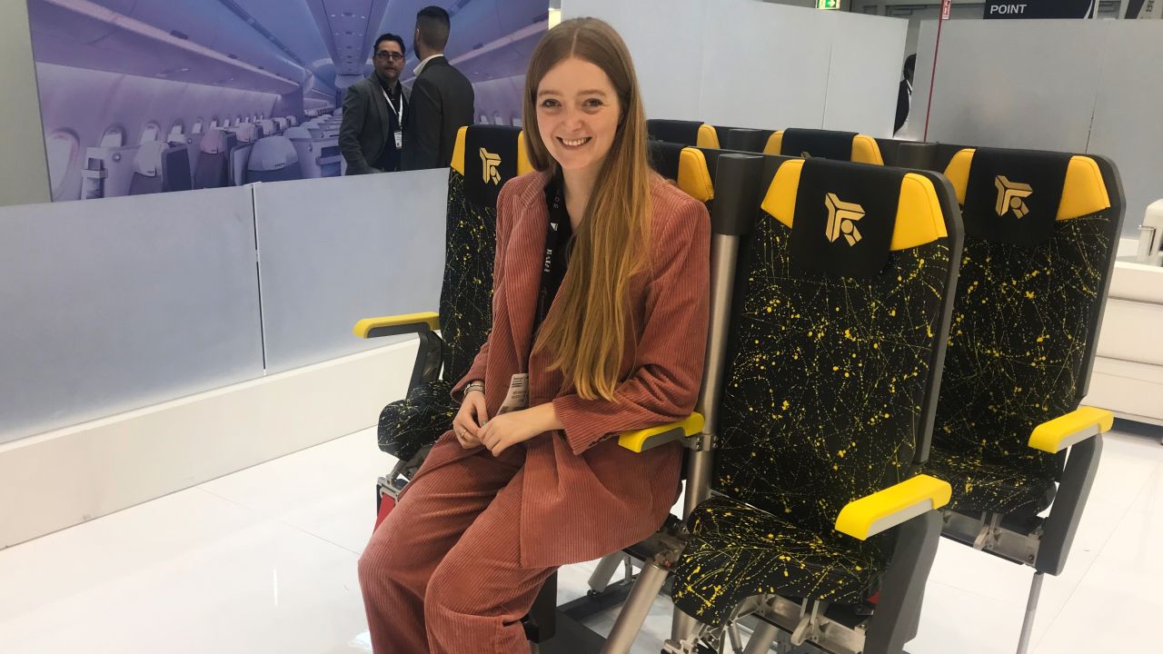 CNN Travel's Francesca Street tests out the seat at AIX.