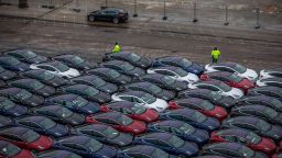 Automobiles produced by Tesla Inc. sit dockside after arriving on the Glovis Courage vehicles carrier vessel at the Port of Oslo in Oslo, Norway, on Friday, March 15, 2019. Tesla made one of the largest deliveries yet of its new Model 3 car to Norway, one of the electric-vehicle producer's biggest markets. Photographer: Odin Jaeger/Bloomberg via Getty Images