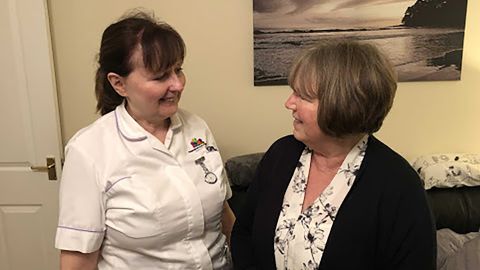Linda Wagner, right, with Hospice at Home nurse Karen.